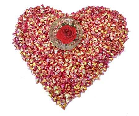 Heart shaped folding paper with a rose insideの写真素材
