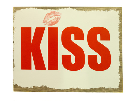 Plate with inscription Kiss. Isolated on white background.の写真素材