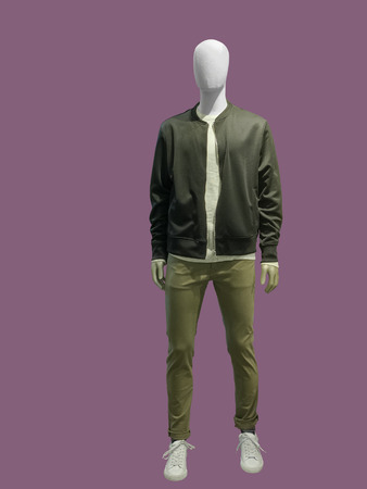 Full-length male mannequin dressed in casual clothes (jacket and trousers), isolated.  No brand names or copyright objects.の写真素材