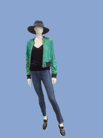 Full-length female mannequin dressed in jacket and blue jeans, isolated. No brand names or copyright objects.の写真素材