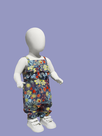 Full-length child mannequin dressed in beautiful clothes, isolated. No brand names or copyright objects.の写真素材