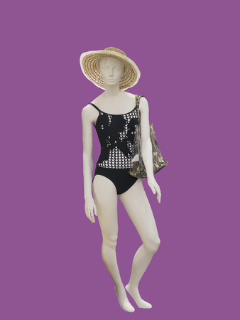 Full-length female mannequin wearing fashionable bathing suit, isolated. No brand names or copyright objects.の写真素材