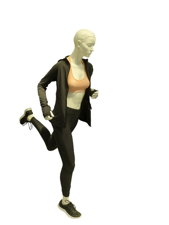 Running female mannequin isolated on white background. No brand names or copyright objects.の写真素材