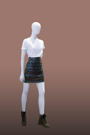 Full-length female mannequin dressed in fashionable clothes, isolated. No brand names or copyright objects.の写真素材