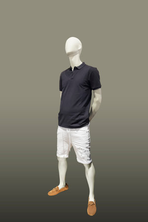 Full-length male mannequin in summer clothes, isolated. No brand names or copyright objects.の写真素材