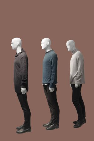 Three male mannequins dressed in casual clothes, isolated. No brand names or copyright objects.の写真素材