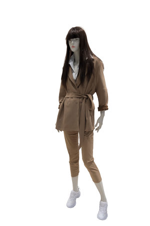 Full length female mannequin dressed in fashionable clothes, isolated on white background. No brand names or copyright objects.の写真素材