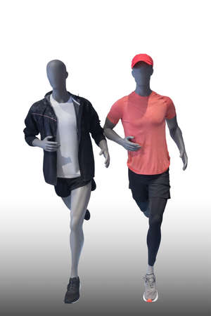 Two running image of a male display mannequins wearing sportswear isolated on a white backgroundの写真素材