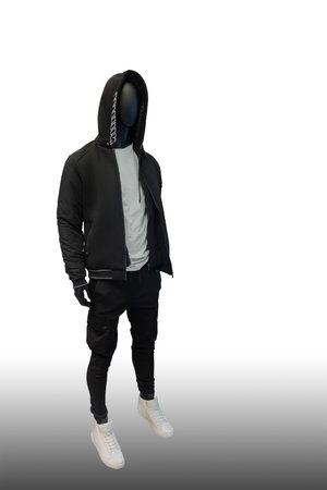 Full length image of a male display mannequin wearing black hoodie isolated on a white backgroundの写真素材