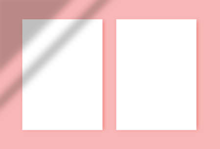 Two white blank A4 papers with shadows on the pink background. Templates for presentation of design like flyer, cover, poster. mock up design templateのイラスト素材
