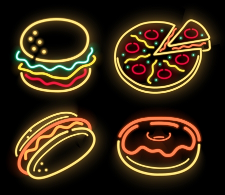 Food symbols in neon isolated on blackの写真素材