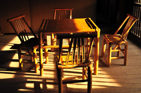 Bamboo table and chairs with sunlightのeditorial素材