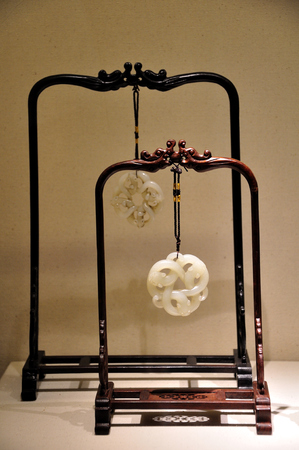 Jade hanging on a mini wooden rackのeditorial素材