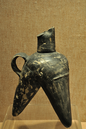 Pottery bag legged vessel displaying in a museumのeditorial素材