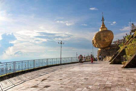 The "Golden Rock" with its terrace in the sun in Myanmar / Burma.の写真素材