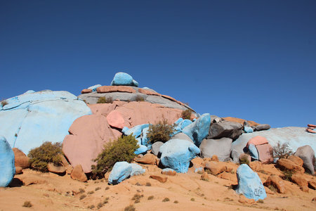 Blue and red rocks in the middle of the dry Atlas mountains in Morocco.の写真素材