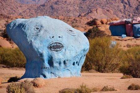 Blue and red rocks in the middle of the dry Atlas mountains in Morocco.の写真素材