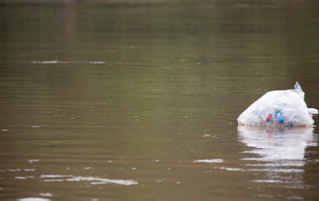 Plastic back floating on the Dokhtawady River in Myanmar.