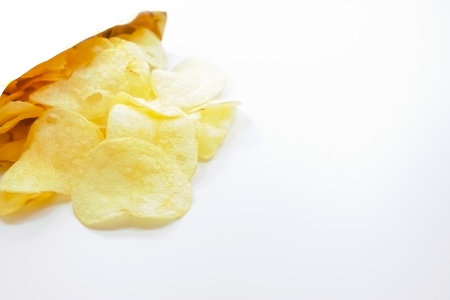 potato chips isolated on white backgroundの写真素材