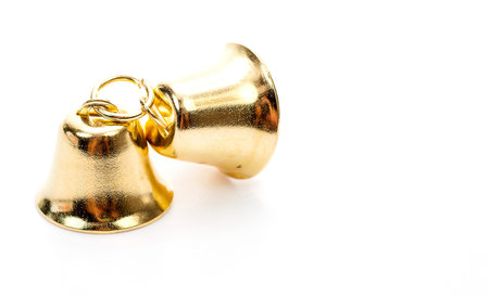Golden bell isolate on white background