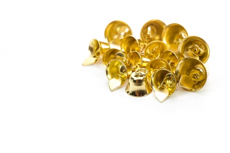 Golden bell isolate on white backgroundの写真素材