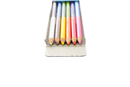 use old pencil color in box on white background isolatedの写真素材
