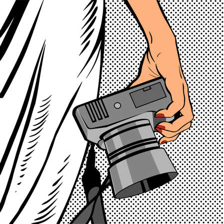 Female hand with a camera. Woman in a white dress. Photographing in the studio. Fashion and beauty industry. Cartoon illustration in pop art styleの写真素材