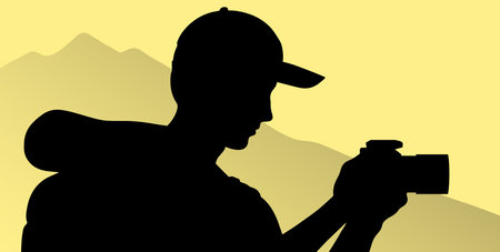 Silhouette hiking man with a camera on the background of wildlife.