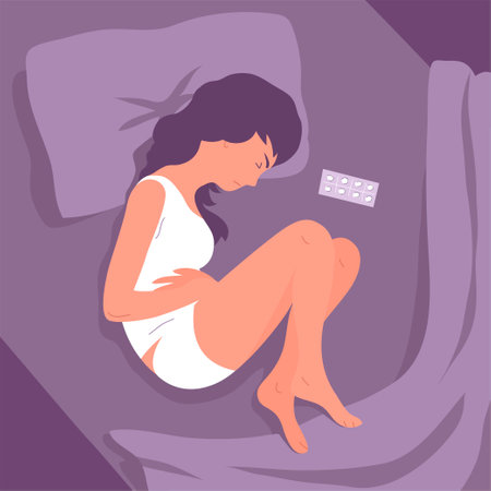 A young woman suffers from abdominal pain. Lying in bed. Symptom of menstruation, acute gastritis, diarrhea. Disease of the gastrointestinal tract. vector illustrationのイラスト素材