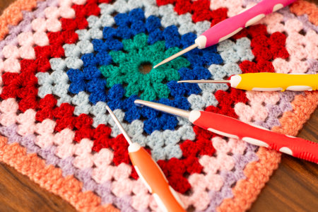 Hooks and threads for crocheting. Hobbies, creativity and handicrafts. Home leisure. Photo view from aboveの写真素材