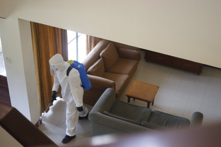Teluk Kemang, Malaysia - April 24, 2020: Disaster Operation conducted by the Malaysian Fire and Rescue Department's Hazmat Special Forces at the Covid-19 Quarantine Interim Center in a hotel.のeditorial素材