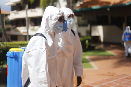 Teluk Kemang, Malaysia - April 24, 2020: Disaster Operation conducted by the Malaysian Fire and Rescue Department's Hazmat Special Forces at the Covid-19 Quarantine Interim Center in a hotel.のeditorial素材
