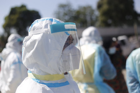 Seremban, November 15, 2020. Sanitation Operations at Top Glover Factory were carried out by Hazmat Special Team due to the increase in Covid-19 cases in the factory.のeditorial素材