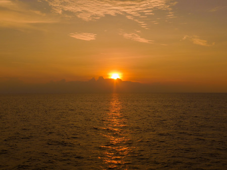 Beautiful sunset over the ocean. Sunrise in the seaの写真素材