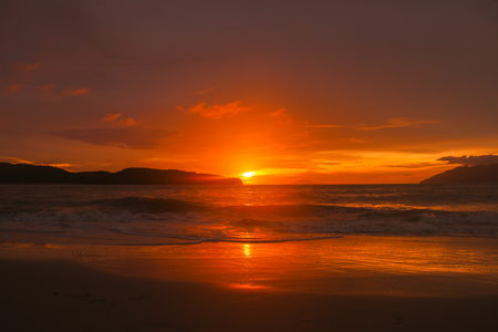 Beautiful sunset over the ocean. Sunrise in the seaの写真素材