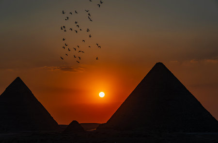 Sunset over the Pyramids of Giza in Cairo, Egyptの写真素材