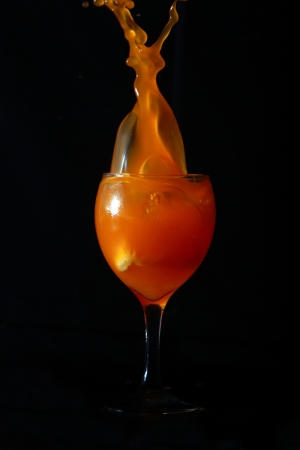 SPLASH OF JUICE IN A GLASSの写真素材