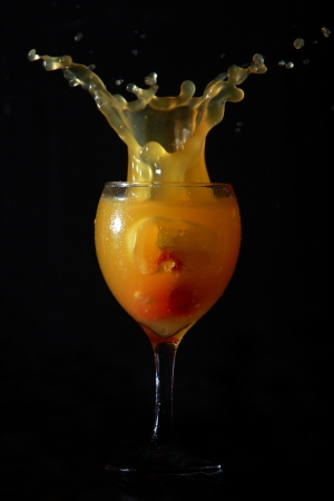 SPLASH OF JUICE IN A GLASSの写真素材