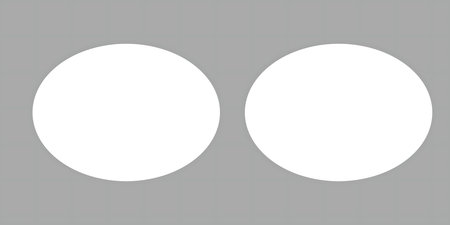 A minimalist composition featuring two identical white ovals positioned side-by-side on a plain gray background.の写真素材