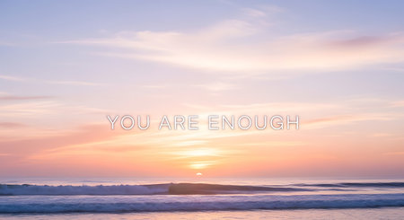 A tranquil beach scene at sunset, featuring soft pastel colors in the sky and calm ocean waves.の素材