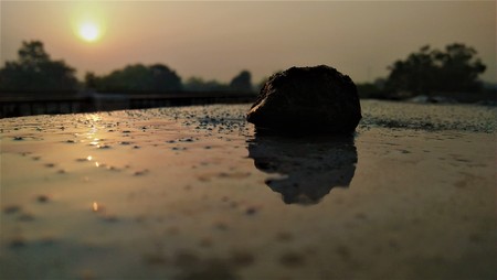 beautiful sunrise with rock shadowの写真素材