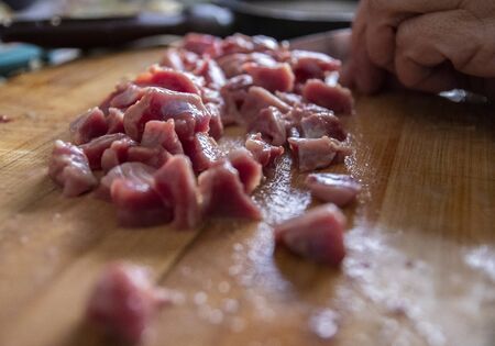 the fresh red pieces sheep meat was preparing in the kitchen by housewifeの写真素材