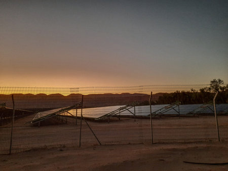 solar energy panel in desert at sunset