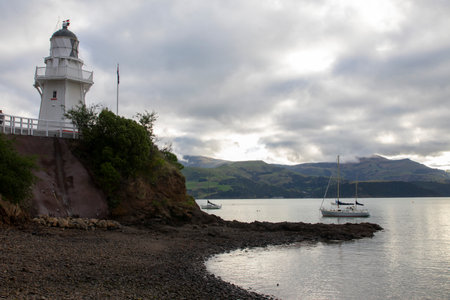 Akaroa is a small town on Banks Peninsula in the Canterbury Region of the South Island of New Zealand, situated within a harbour of the same nameの写真素材