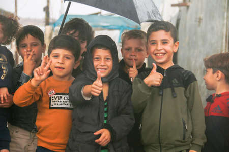 A group of refugee children in the camp in the rain.
Aleppo, Syria October 17, 2021のeditorial素材