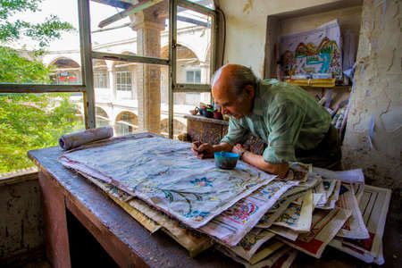 Carpet designer in historical bazaar of Arak in Iran. / Rug, Kilimのeditorial素材