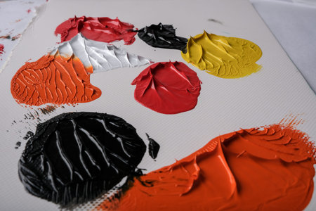 abstract photo of oil paintns mixing on canvas