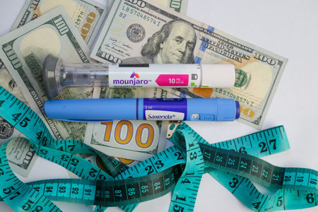 Basra, Iraq - August 5, 2025: Mounjaro and Saxenda Pens for Costly Weight Loss Managementの写真素材