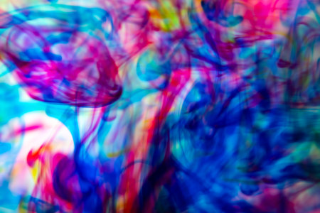 Vibrant abstract background with swirling colorful patterns.の写真素材
