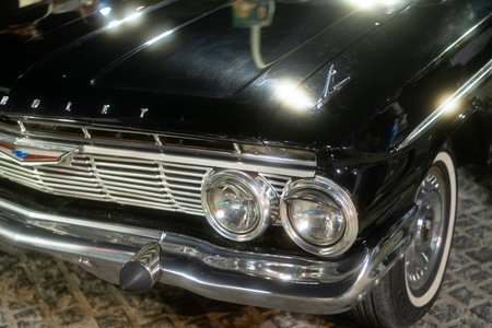 Close-up of a classic black Chevrolet car with chrome details and round headlightsのeditorial素材